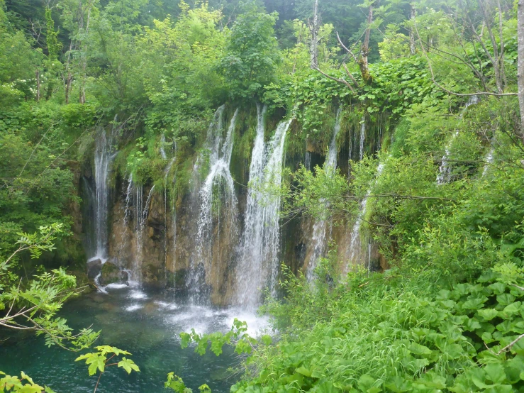 a large waterfall with lots of water in it