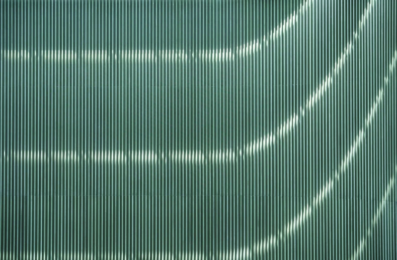 a long curtain with an overlapping pattern of lines in a diagonal order