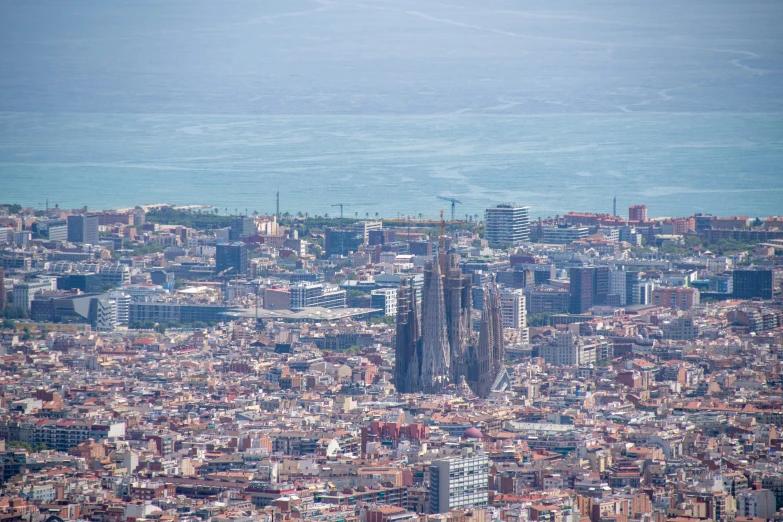 an aerial view of a city with tall buildings and tall skyscrs