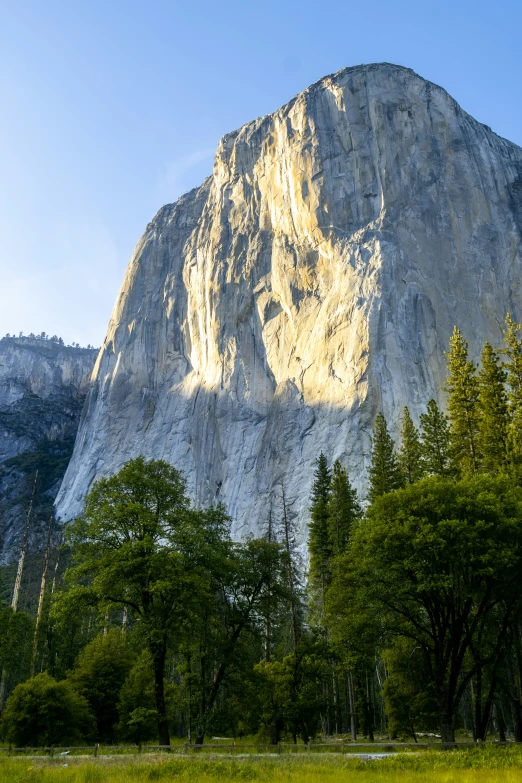 the mountain is rising up from the ground