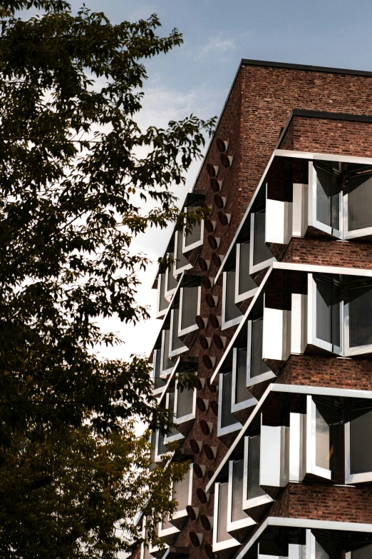 a very tall brick building with some windows on it