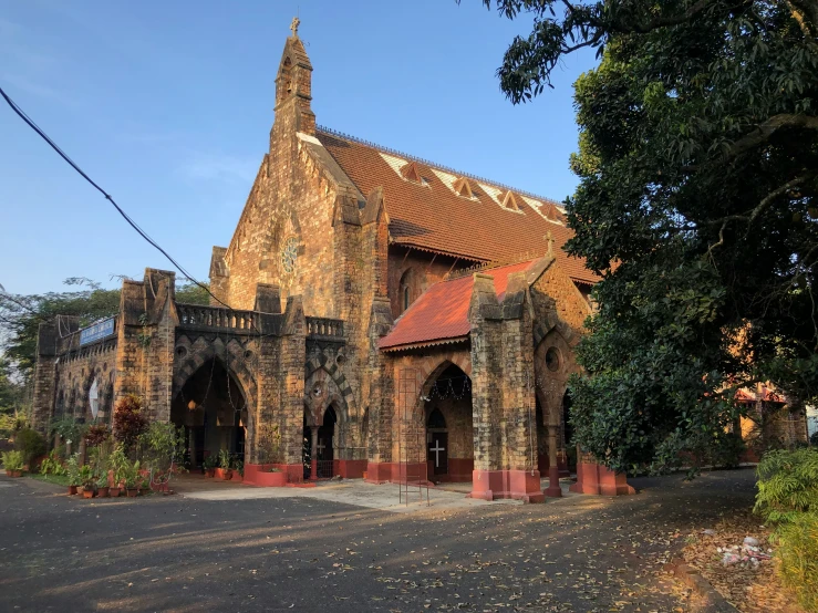 an old church is shown with a clock tower