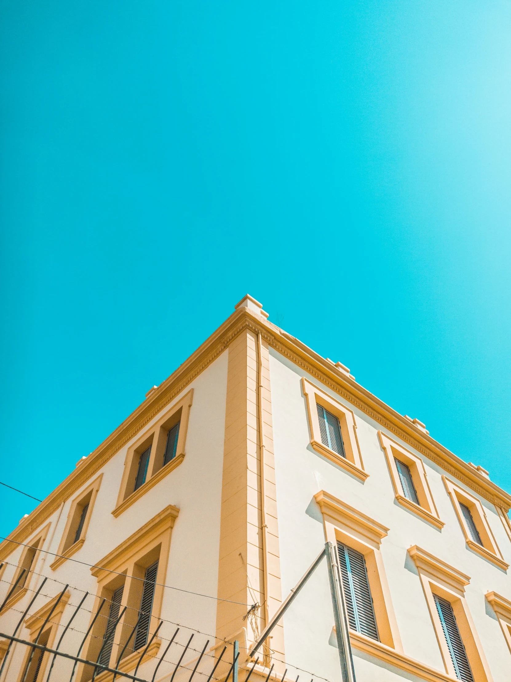 a building is standing out against the sky