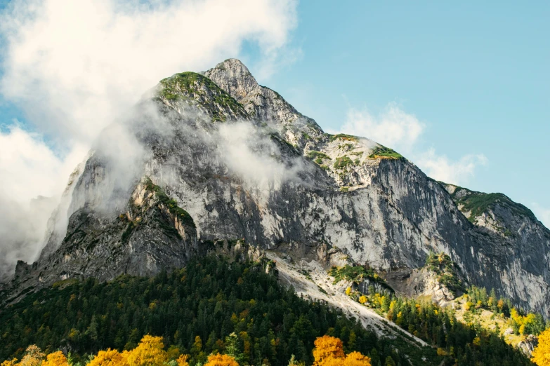 a hill with some tall mountains on it