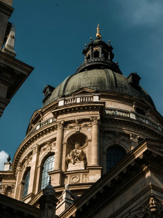 a dome on top of a building under a blue sky