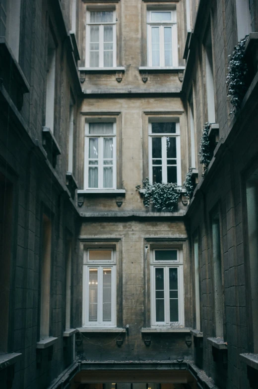 three windows sitting high up into the air