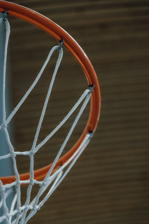 a basketball is inside of the net