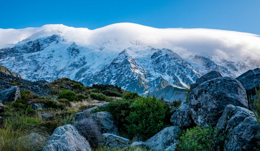 the mountain landscape with many rocks in front of it