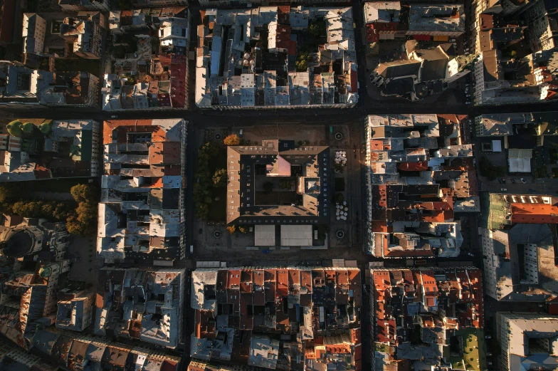 top down aerial s of many buildings in a city