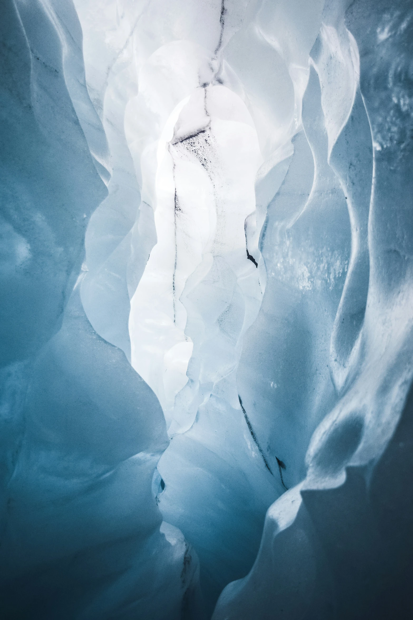 the inside of an ice cave is seen