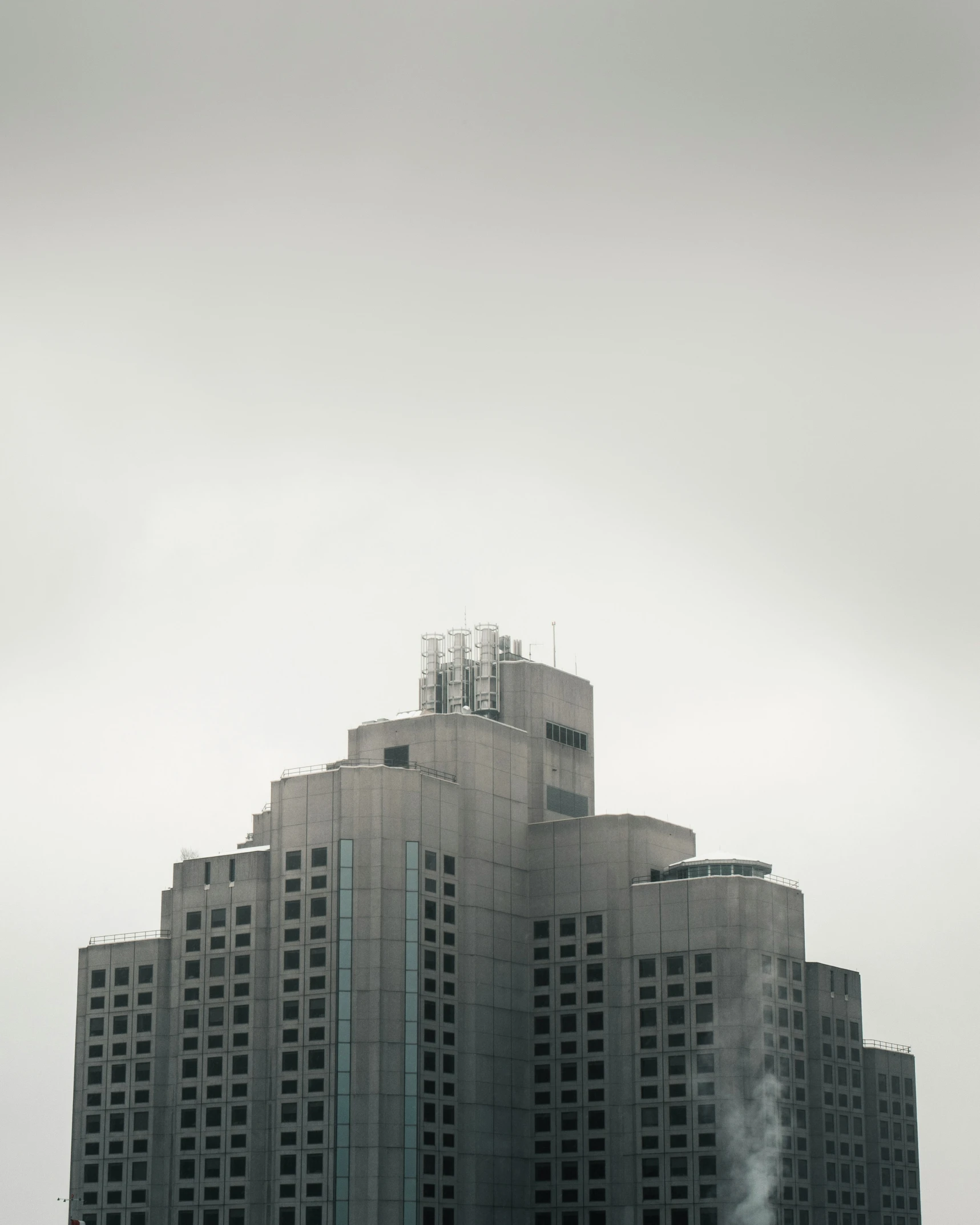 a tall building sitting in front of a sky