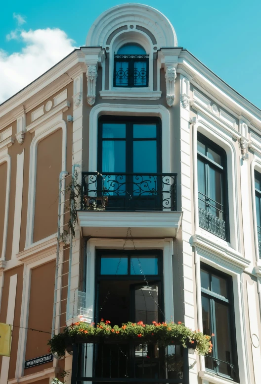 an old looking building with many windows and balconies