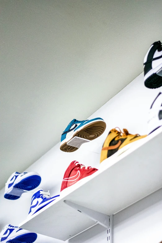 closeup of colorful sneakers on the edge of a closet