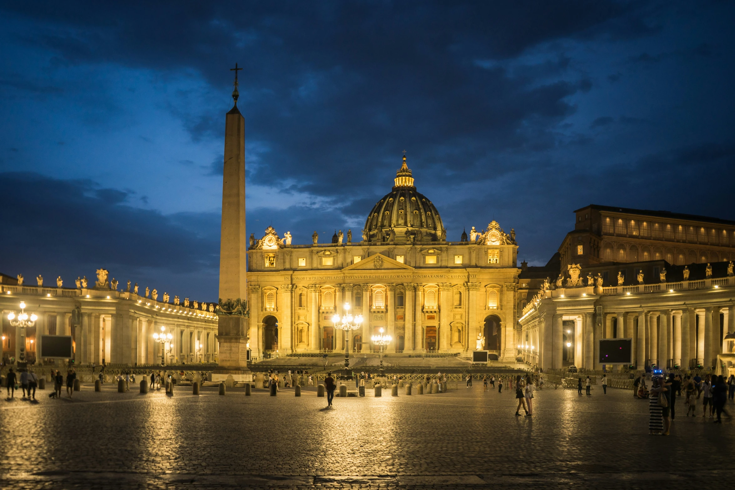 large building with very tall spire at night