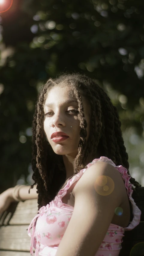 an image of a girl with long dread locks