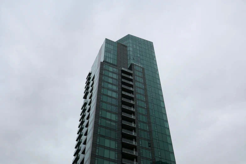 the building is very tall and has a lot of windows
