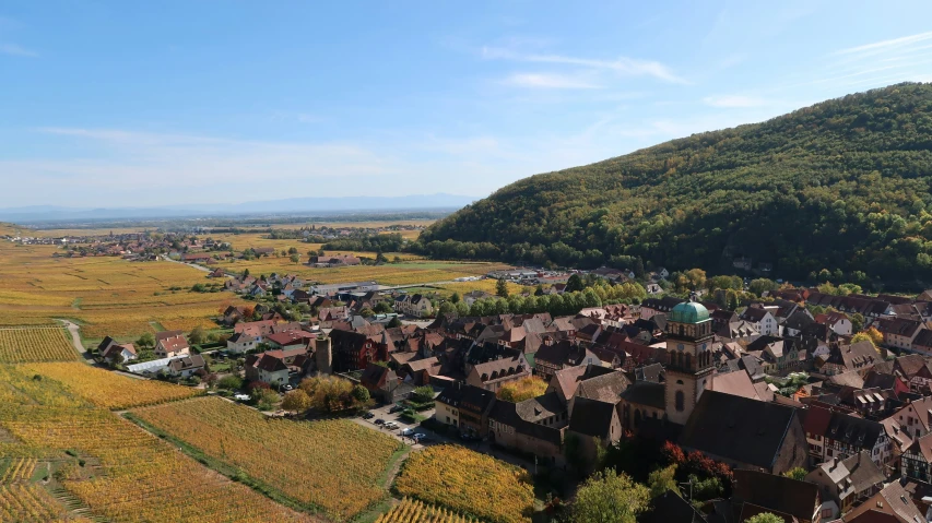 a scenic view of houses and countrysides from above