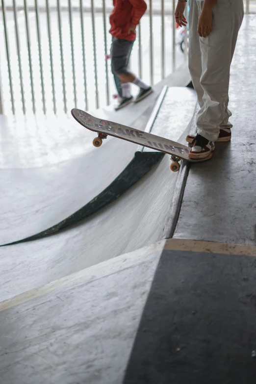 someone on skate board balancing his board on a ramp