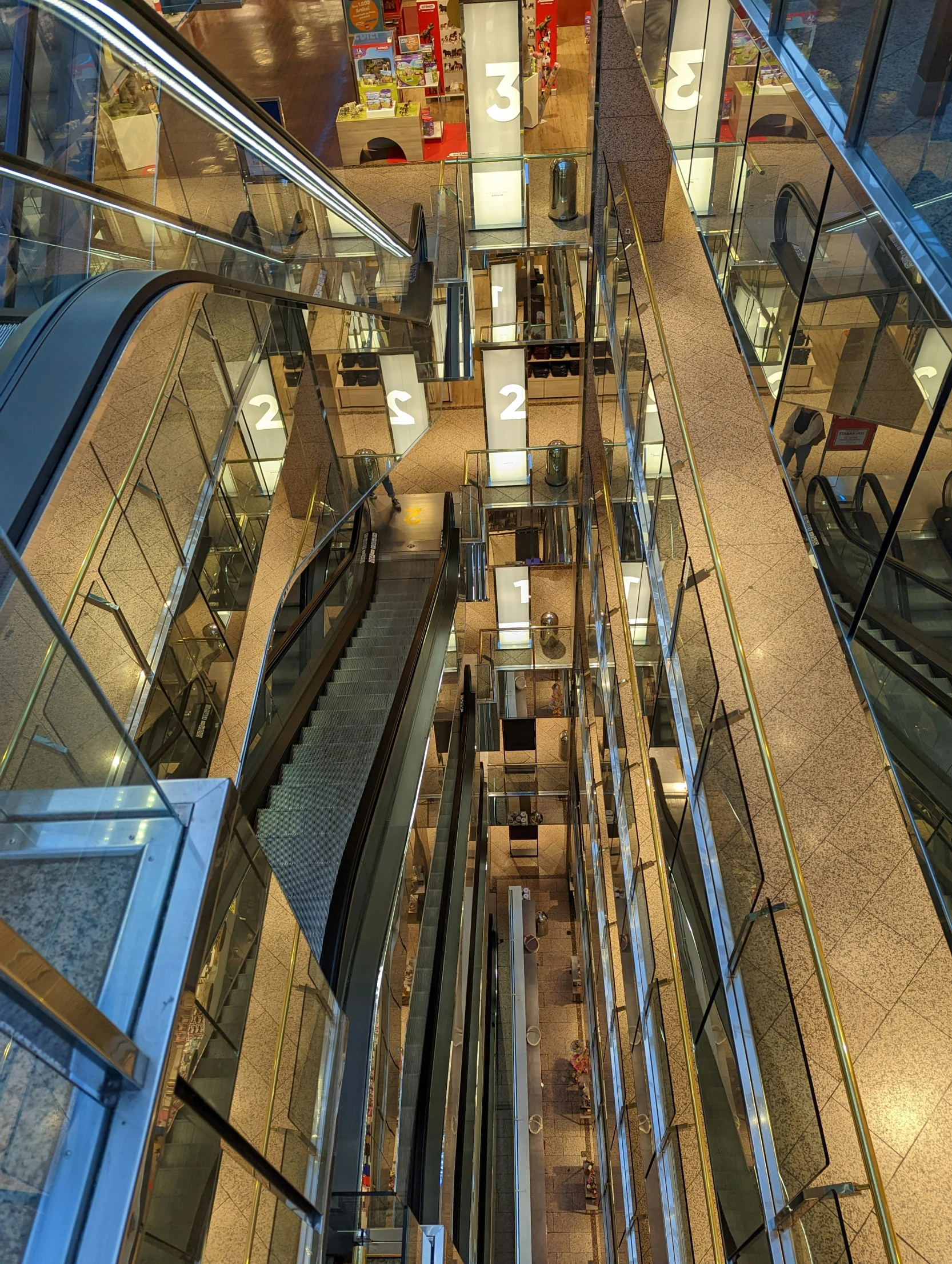 view of an escalator in an office building