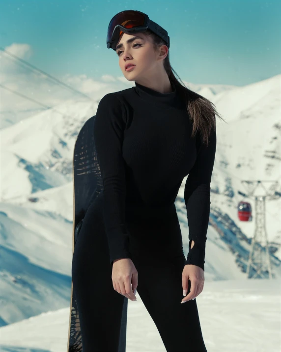 a woman wearing a hat and sunglasses is on the snow with her board