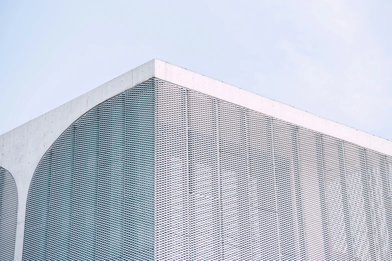 a building is shown in white with a lot of random lines