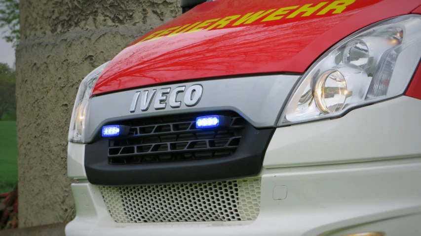 the front end of an emergency car with the word'ineo'written on it