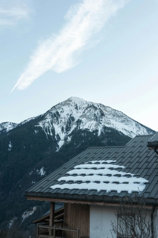 there is a snow covered mountain in the distance