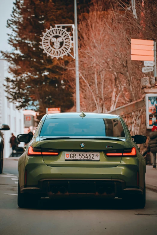 a car parked on the side of the road in a city