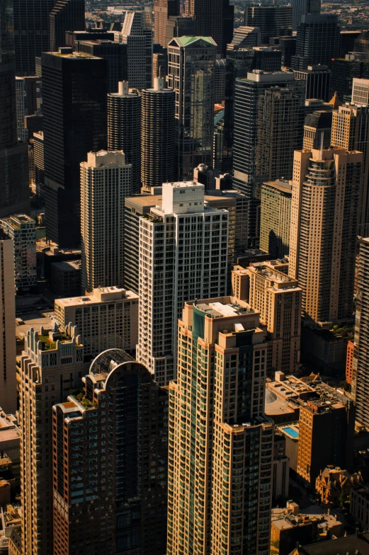 an aerial view of a large city with lots of tall buildings