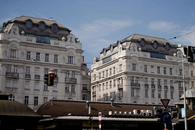 two buildings near each other, in a city