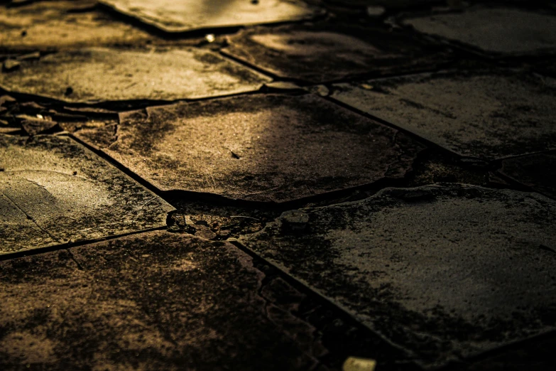 a black and white image of pavement made from concrete