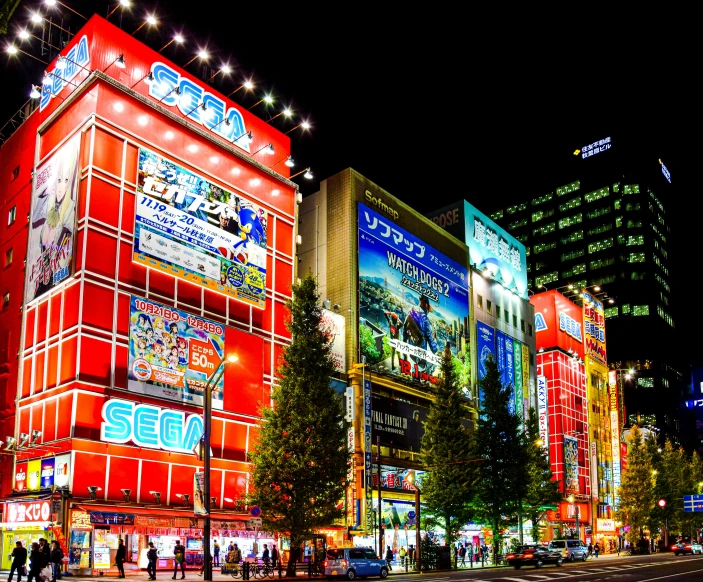 colorfully lit buildings in a metropolitan city at night