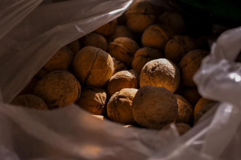 a bag full of nuts sitting on top of a table