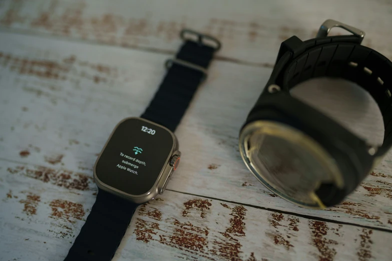 an apple watch with a gps function sitting on a table