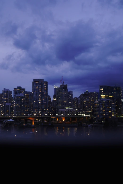 cityscape with the lights turned on in the night