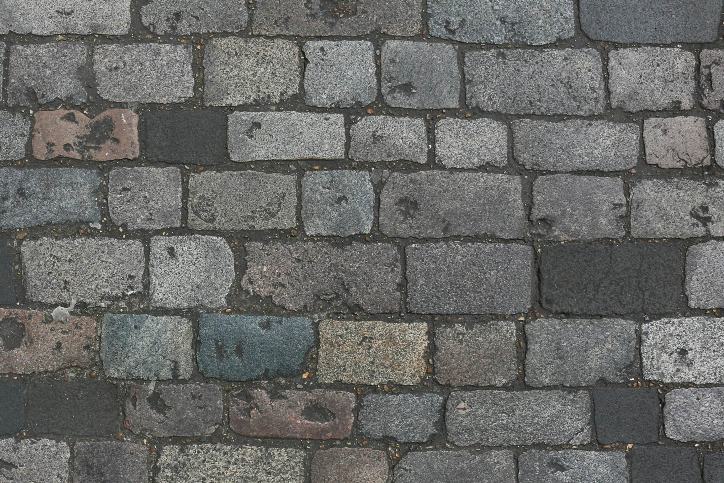 a large stone path made of small squares