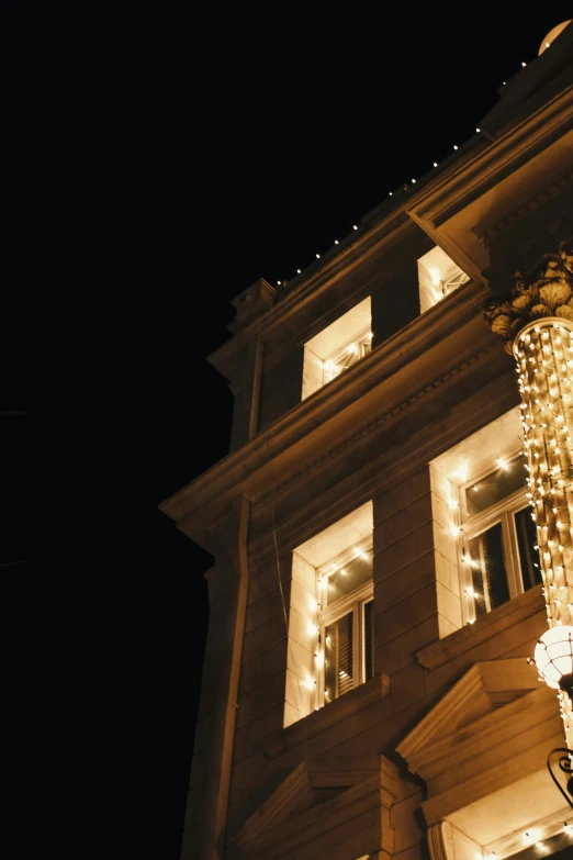 there is a building that has a chandelier in the front