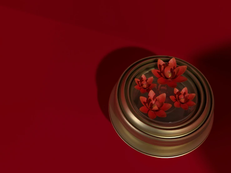 small red flowers in the lid of a brown vase