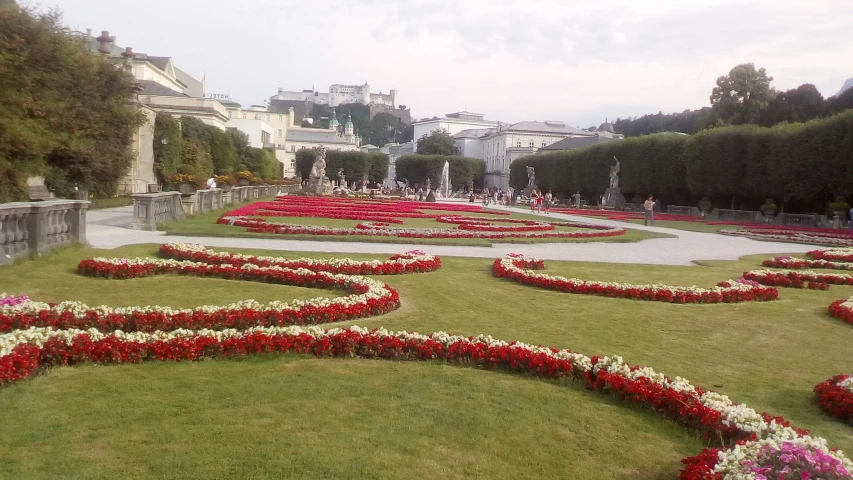 an intricate display of flower bedding and circular designs