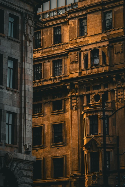 a very big building with some windows and light on