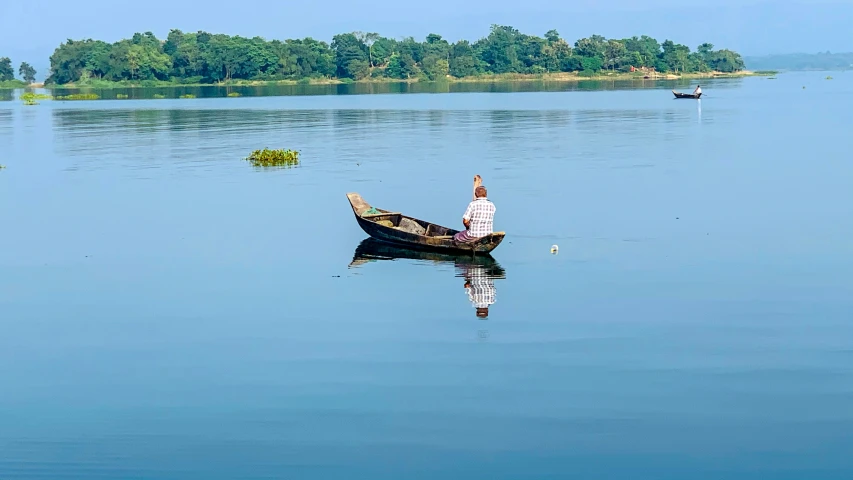 the calm water is very calm for the boats