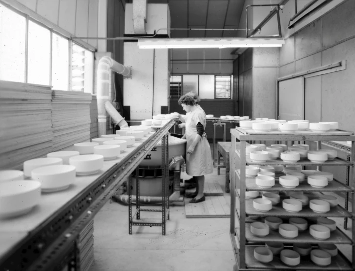 two women are working in an industrial kitchen