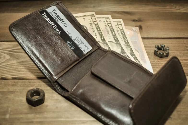 an empty wallet is sitting on a table