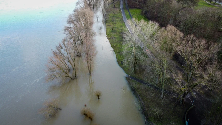 this is an aerial view of flood waters near houses