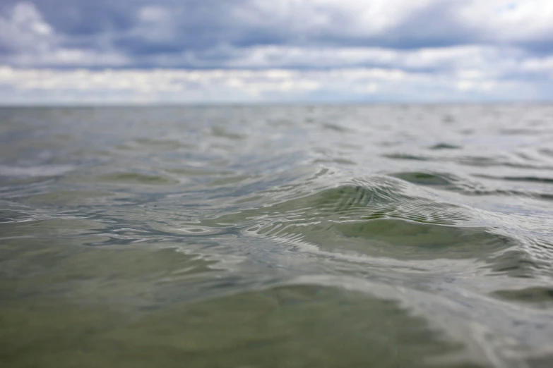 a blurry pograph of the surface of the ocean