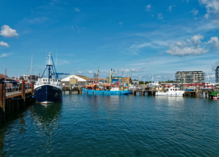 there are many boats docked at the pier