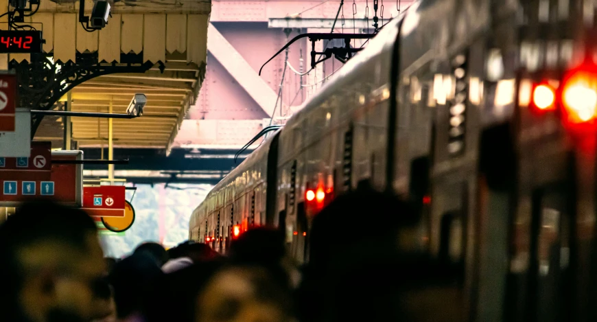 an image of a subway that is going down the track