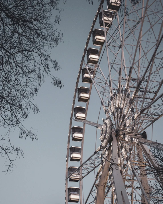 the ferris wheel with its many seats on top
