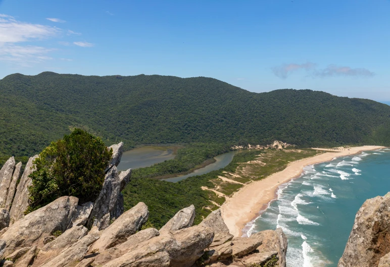 the coastline and ocean near some mountains in china