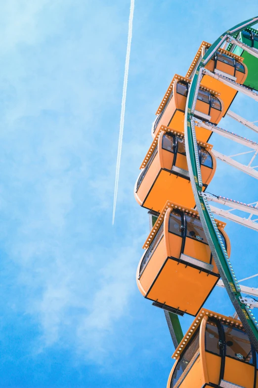 some people riding a ride at an amut park